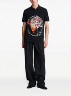 FesFas Human Face-print Polo Shirt | Black