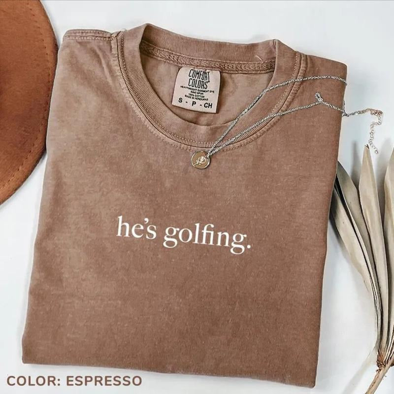 Comfort Colors He's Golfing T-Shirt, Golfing Season T-Shirt, Golfer Wife TShirt, Golfing Mom Tee, Golf Player T-Shirt for...